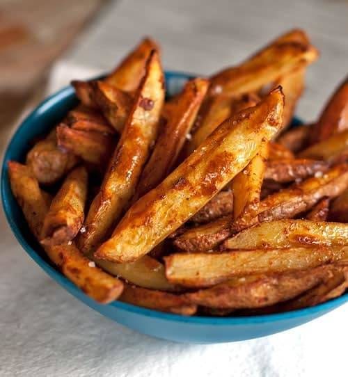 A picture of Baked Spicy Fries with Garlic Cheese Sauce