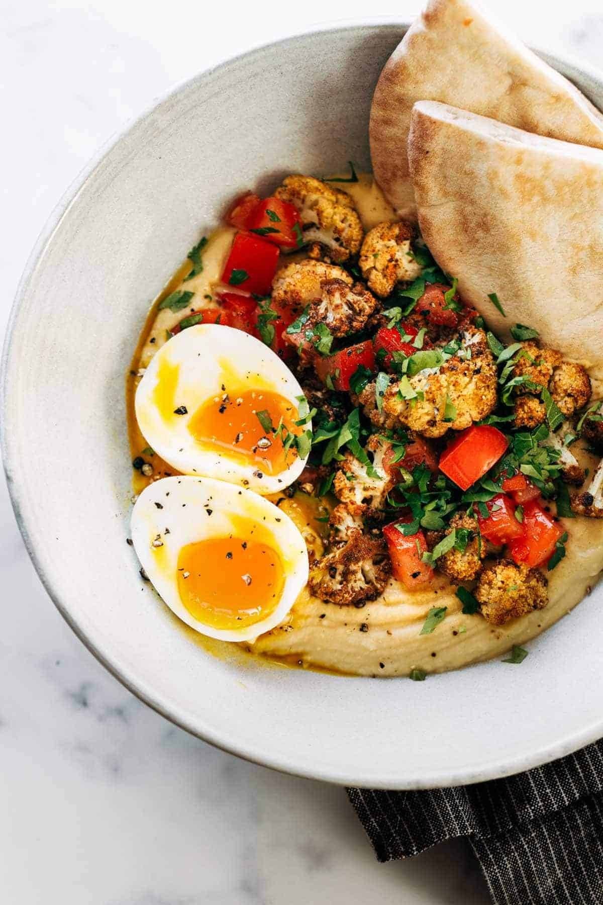 Hummus with roasted cauliflower on top.