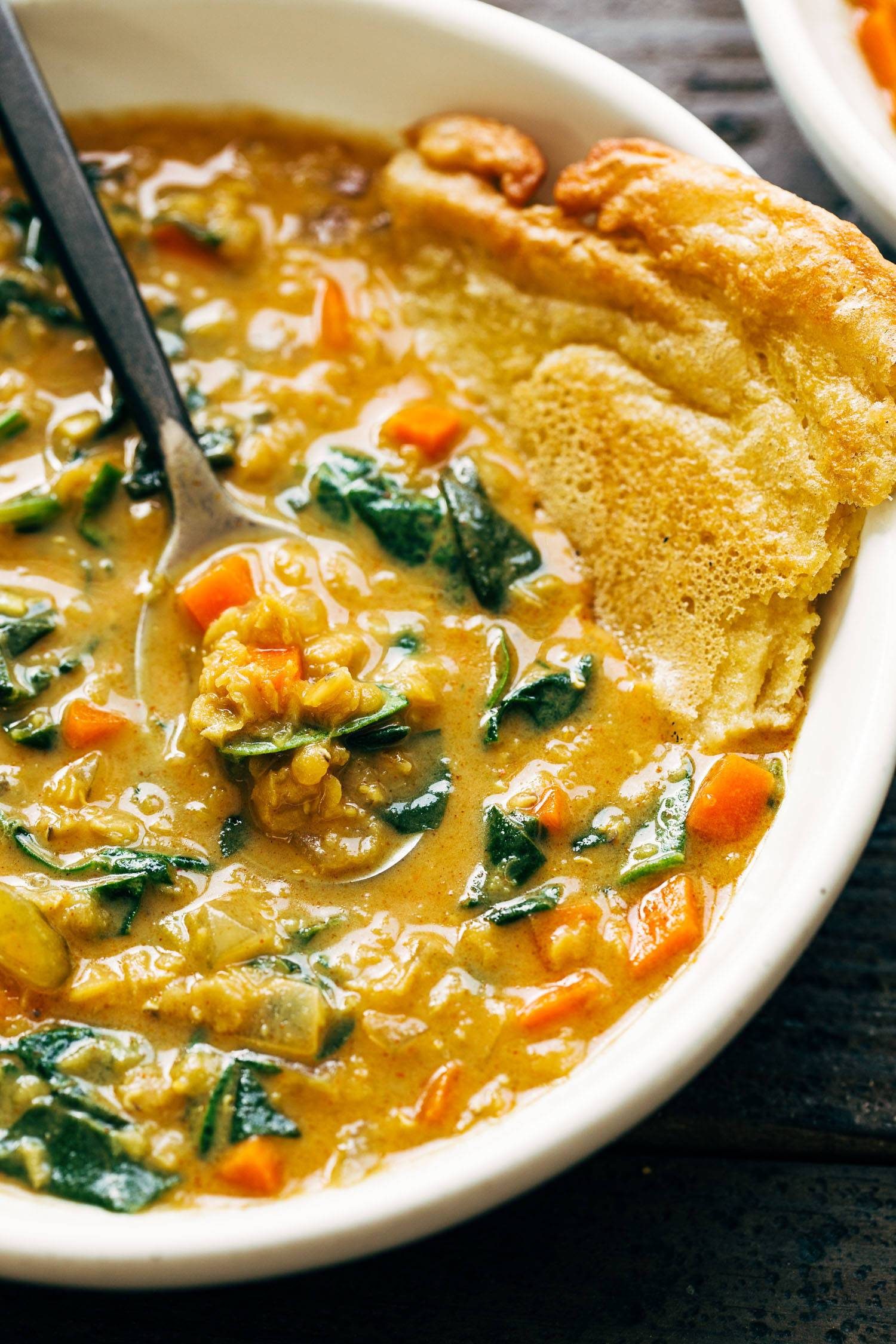 Smoky red lentil soup with socca.