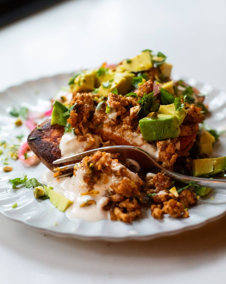 Sweet potato stacks with avocado and chipotle sauce.