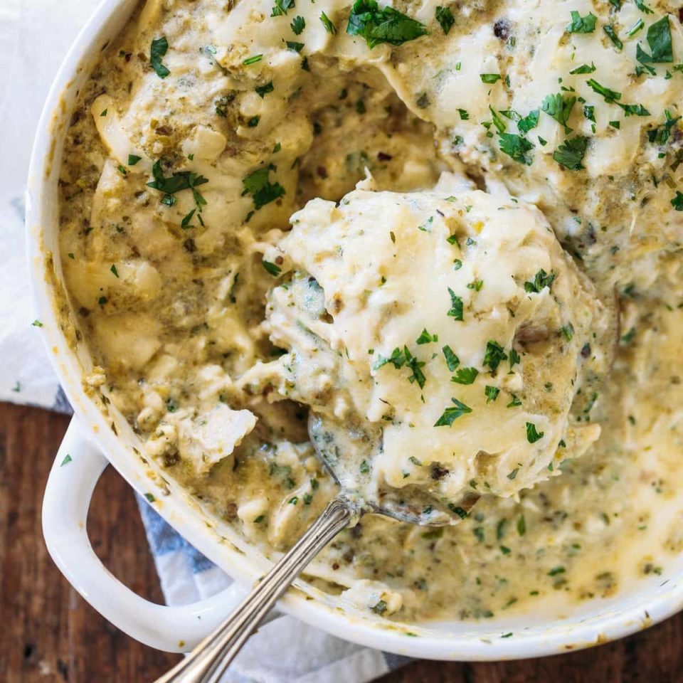 Roasted Tomatillo Chicken Enchilada Casserole in casserole dish.